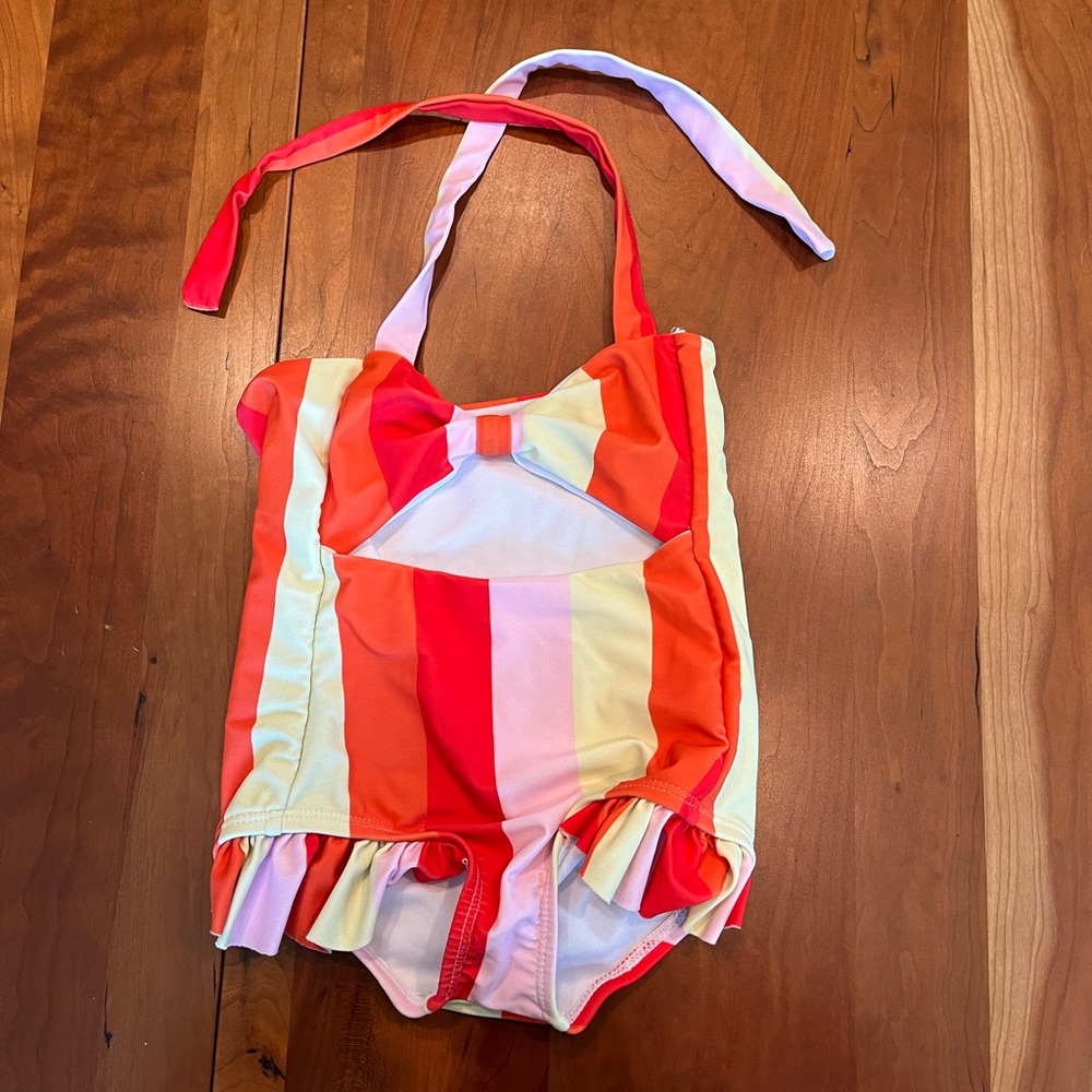 Striped one piece swimsuit with cutout
